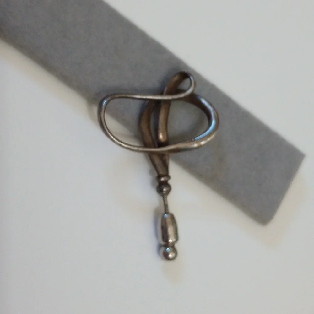Vintage calla lily flower pin marked MoMA and sterling